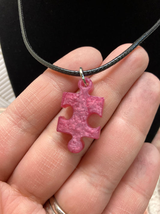 Puzzle piece pink pendant