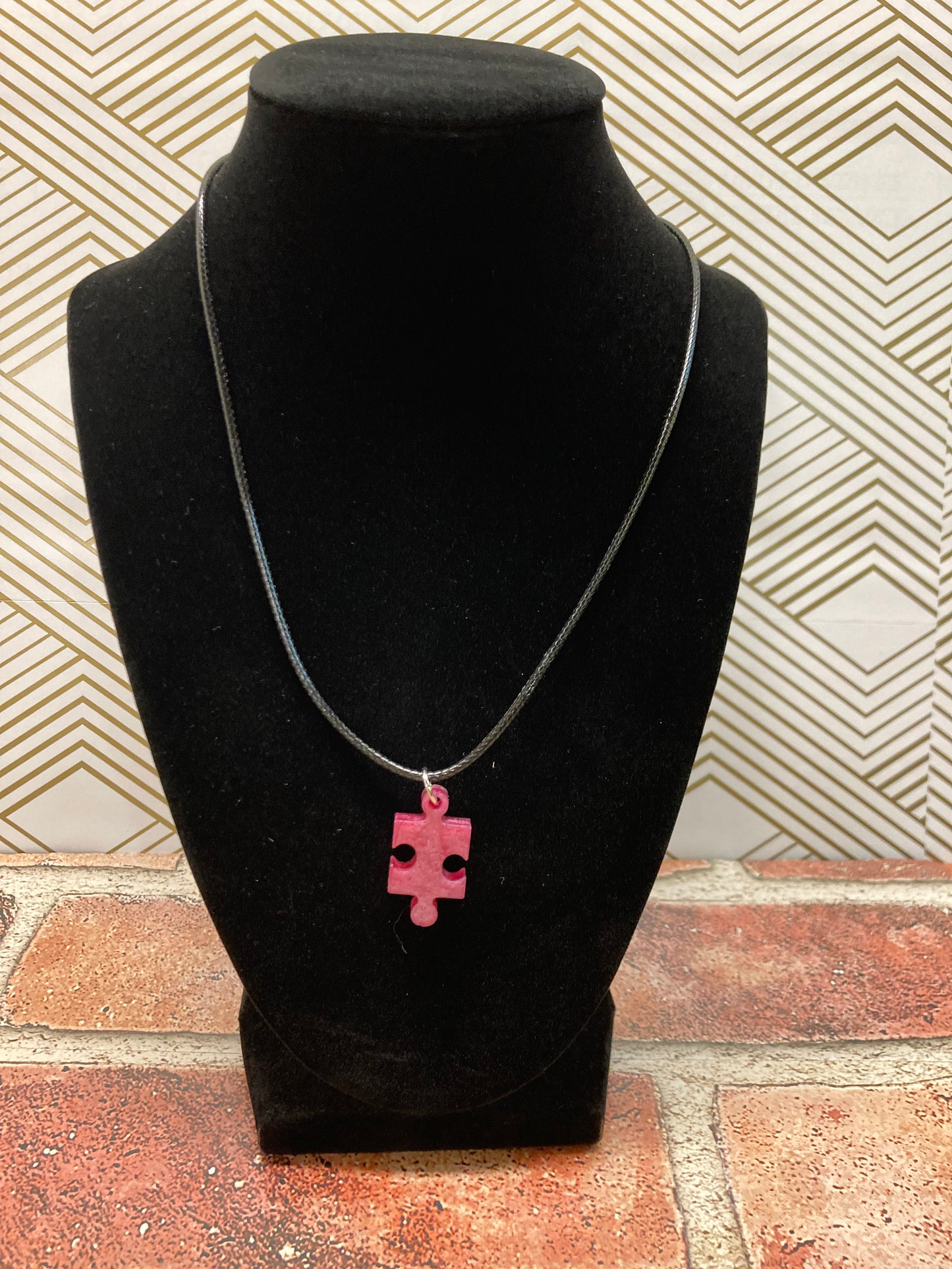 Puzzle piece pink pendant